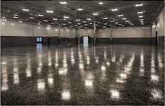 Industrial-grade epoxy floor coating in large Austin, Texas commercial facility