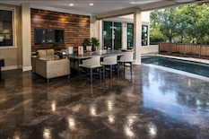 Polished concrete patio coating on luxury Austin, Texas home with pool area